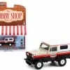 ModelToyCars 1967 Nissan Patrol With Vintage Gas Pump Texaco, Cream/Ivory /Black/White - Greenlight 97100A/48 - 1/64 Scale Diecast Model Toy Car -Diecast Cars Store 97100a gl cream 1967 nissan patrol with vintage gas pump texaco diecast toy car 1 35661.1618254388.386.513